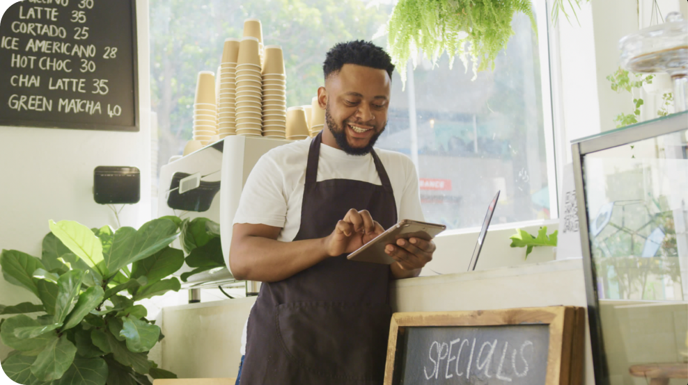 An employee is using Modisoft cafe POS system in a tablet.