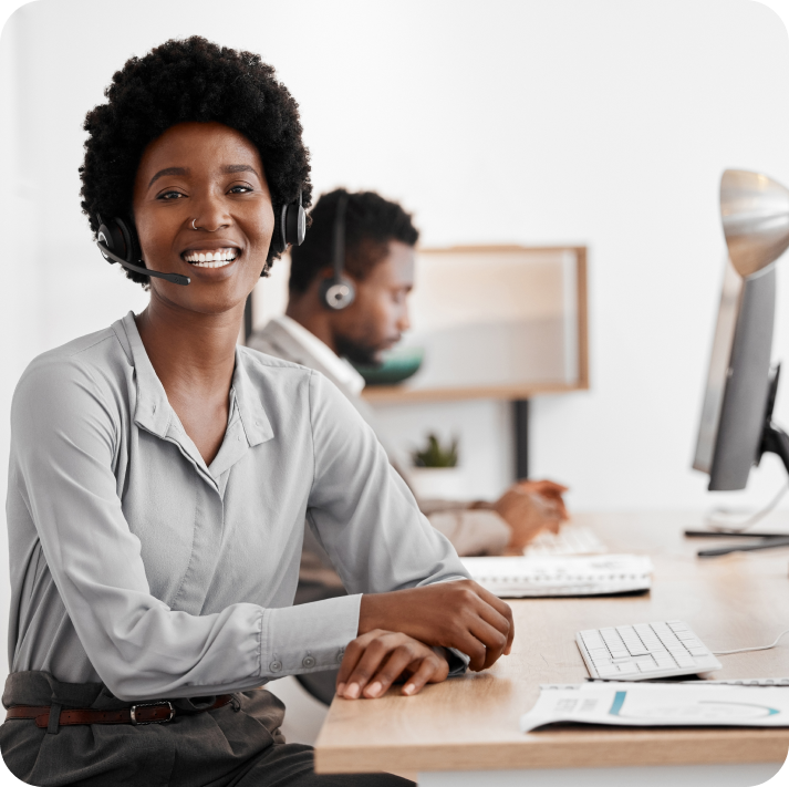 A female customer support agent is addressing customers while wearing the headset.